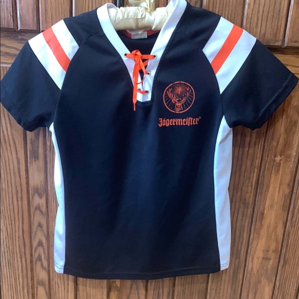 Jagermeister women top 
Size Small orange and black